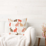 Easter Bunnies Throw Pillow<br><div class="desc">20” x 20” throw pillow with an image of brown,  orange and pink Easter bunnies on white. Orange back. See matching 16" round throw pillow and 12" x 16" accent pillow. See the entire Easter Pillow collection under the HOME category in the HOLIDAYS section.</div>