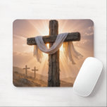 Easter Crosses On a Hill Mouse Pad<br><div class="desc">A central wooden cross,  covered with a white cloth and illuminated by the warm glow of the setting sun,  stands out against two additional crosses on a rocky hillside in the background</div>