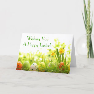 Easter Eggs Hiding in Grass with Daffodils Holiday Card