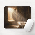 Easter Empty Tomb with Shroud Mouse Pad<br><div class="desc">Sun rays illuminate a stone tomb through an open entrance, casting dramatic shadows on a draped cloth resting on a stone slab that hints at a significant absence</div>