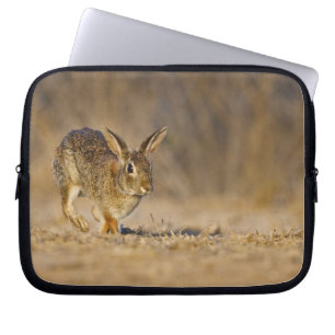Eastern cottontail rabbit hopping laptop sleeve