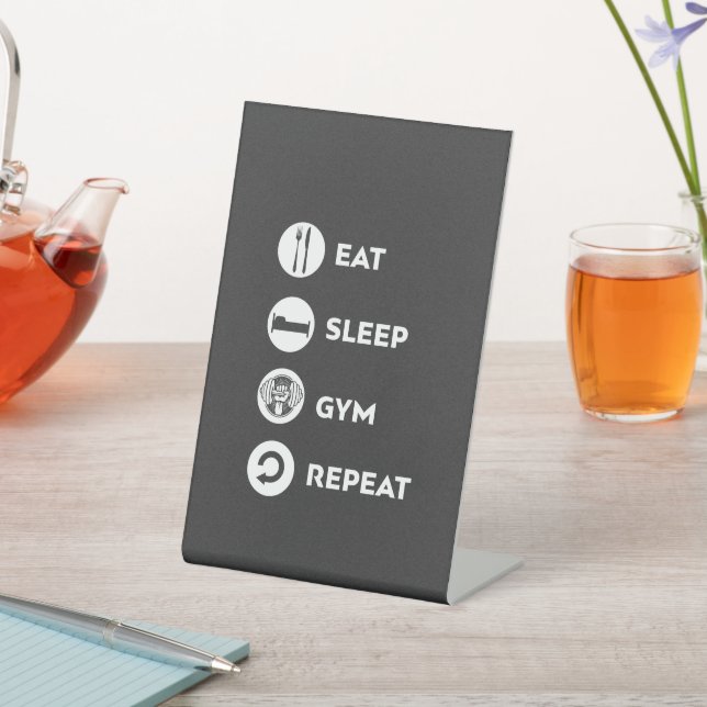 EAT SLEEP GYM REPEAT PEDESTAL SIGN (In SItu)