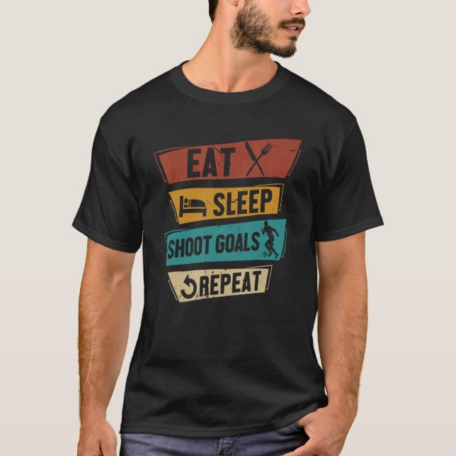 Eat Sleep Shoot Goals Repeat Striker Soccer Player T-Shirt (Front)