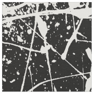 Éclaboussure blanche sur le tissu noir