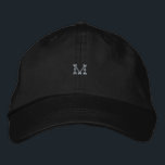 Eclipse Black M Alphabet Printed-Hat Urban Style  Embroidered Hat<br><div class="desc">Add a bold contemporary edge to your wardrobe with this Black Adjustable Cap featuring a finely embroidered “M” emblem for a stylish personalized appearance. The deep black finish delivers a clean versatile look that complements modern streetwear, sporty outfits, travel fashion, and relaxed casual styling. Precision stitching craftsmanship creates a refined...</div>