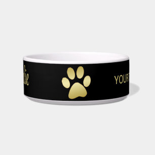 Écuelle Paw chien brillant or sur arrière - plan noir