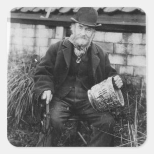 Edward Bingham holding one of his Castle Square Sticker
