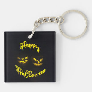 Eerie pumpkins with yellow Happy Halloween Keychain