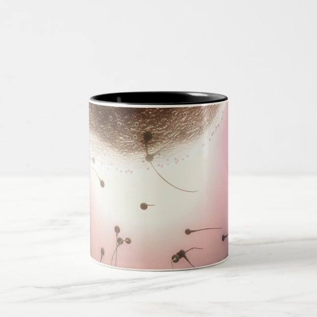 Egg being fertilized by sperm Two-Tone coffee mug (Center)