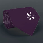 Eggplant | Elegant Monogram Name | one-Sided Tie<br><div class="desc">An elegant one-sided necktie featuring a bold white monogram across an Eggplant purple backdrop. On top of this monogram sits your first or last name spelled out in all capitals. If you prefer a bolder look for the personal name inside of the large letter you can do the following: Use...</div>