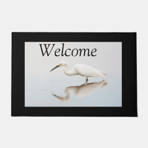 Egret on still pond  doormat