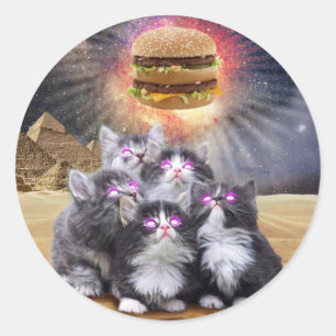 Egyptian cats looking at a hamburger classic round sticker