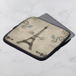 Eiffel Tower Grunge Laptop Sleeve<br><div class="desc">Protect your laptop while you're on the go with this alluring sleeve design featuring a grunge background adorned with the Eiffel Tower,  swirls and butterflies in teal.  Customizable text allows you to alter fonts,  change text colors and sizes as you wish.  Personalize for yourself or makes a great gift.</div>