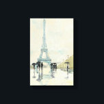 Eiffel Tower | Paris In The Rain Canvas Print<br><div class="desc">© Avery Tillmon / Wild Apple.  A vintage image of Paris,  and people walking around. An image of the Eiffel Tower can be seen.</div>