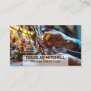 Electrician Working with Wires in Fuse Box Business Card