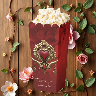 Elegance in red lustre with an ornate heart.  favor box