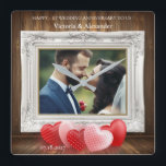 Elegant 1st Wedding Anniversary Photo Clock<br><div class="desc">Celebrate your love with this beautifully designed custom photo wall clock! Featuring a classic wood panel background, ornate white frame, romantic heart graphics, and personalized names and date, it’s the perfect keepsake for your 1st wedding anniversary. Customize with your favourite photo, names, and date for a truly unique gift that...</div>