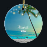 Elegant 2 Sided Photo Hawaii Palm Trees Lights Ceramic Ornament<br><div class="desc">Create a keepsake of your trip to Hawaii with this custom elegant ornament featuring a landscape photograph of tropical palm trees standing over a sandy Hawaiian beach and boar, enhanced with string lights, with the year on the front, and your own photo on the back. Easy to customize with the...</div>