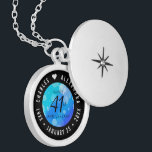 Elegant 41st Blue Topaz Wedding Anniversary Locket Necklace<br><div class="desc">Commemorate the 41st wedding anniversary with this elegant locket! Elegant black and white lettering with hexagonal confetti on a cerulean blue background add a memorable touch for this special occasion and extraordinary milestone. Customize with the happy couple's names, and add dates for their blue topaz anniversary. Design © W.H. Sim,...</div>