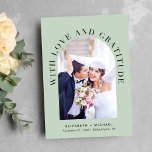 Elegant Arch Photo Love Gratitude Sage Wedding Thank You Card<br><div class="desc">Modern light sage green wedding thank you card featuring your photo in an arched frame, "With Love And Gratitude" in elegant typography and your first names or married name, wedding date and location. On the reverse side, personalize your thank you message in simple typography, and add an additional photo and...</div>
