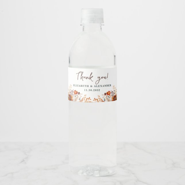 Elegant autumnal floral names and wedding date water bottle label (Front)