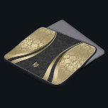 Elegant Black And Gold Damasks Dynamic Stripe Laptop Sleeve<br><div class="desc">Elegant gold tones and black vintage floral damasks combination with gold dynamic lines accents and customizable monogram.</div>
