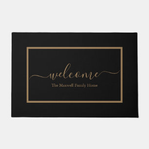 Elegant black and gold script family name welcome  doormat