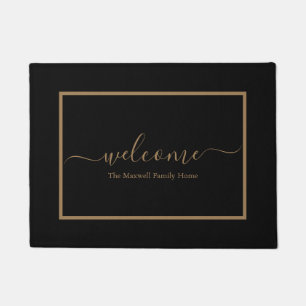 Elegant black and gold script family name welcome doormat