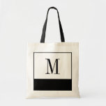 Elegant Black and White Monogram Bag<br><div class="desc">If you're looking for a bridesmaid bag or a unique personalized bridesmaids gift idea, these elegant little black and white bags are the answer! The bag is available in all different sizes, and come in a white background with a large black colour block on the bottom. Each bag can be...</div>