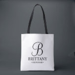 Elegant Black and White Personalized Bridesmaid Tote Bag<br><div class="desc">Elegant Black and White Personalized Bridesmaid Gifts
featuring personalized monogram in elegant calligraphy font style with bridesmaid's name and title in classic serif font style.

Also perfect for Maid of Honour,  Flower Girl,  Mother of the Bride and more.</div>