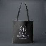 Elegant Black and White Personalized Bridesmaid Tote Bag<br><div class="desc">Elegant Black and White Personalized Bridesmaid Gifts
featuring personalized monogram in elegant calligraphy font style with bridesmaid's name and title in classic serif font style.

Also perfect for Maid of Honour,  Flower Girl,  Mother of the Bride and more.</div>