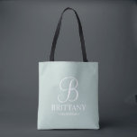 Elegant Black and White Personalized Bridesmaid Tote Bag<br><div class="desc">Elegant Black and White Personalized Bridesmaid Gifts
featuring personalized monogram in white elegant script font style with bridesmaid's name and title in classic serif font style on sage green background.

Also perfect for Maid of Honour,  Flower Girl,  Mother of the Bride and more.</div>