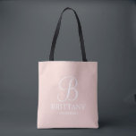 Elegant Black and White Personalized Bridesmaid Tote Bag<br><div class="desc">Elegant Black and White Personalized Bridesmaid Gifts
featuring personalized monogram in white elegant script font style with bridesmaid's name and title in classic serif font style on blush pink background.

Also perfect for Maid of Honour,  Flower Girl,  Mother of the Bride and more.</div>
