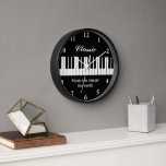 Elegant black and white piano keys wall clock<br><div class="desc">Elegant black and white piano keys wall clock. Personalize with name, monogram, quote or slogan. Custom background colour. Unique Birthday gift ideas for piano player, pianist, classical music teacher, musician, instructor, producer, artist etc. Classy time clock for office, school, living room, kitchen, studio, bedroom, bar, cafe etc. Music can change...</div>
