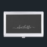 Elegant Black and White Script Name Personalized   Business Card Holder<br><div class="desc">A clean and sophisticated business card case featuring a solid black backdrop with an elegant white calligraphy-style name centred for a refined personal touch. This look is perfect for professionals, entrepreneurs, or students who want a minimalist aesthetic with a stylish, modern edge. The contrast of dark and light keeps it...</div>