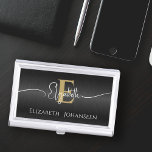 Elegant Black Brushed Metal Girly Gold Monogrammed Business Card Holder<br><div class="desc">Elevate your networking game with our 'Elegant Black Brushed Metal Girly Gold Monogrammed Business Card Case'! This sleek case offers sophistication and personalization, featuring a brushed metallic black background, a bold gold monogram, and a chic white girly script name. Personalize it further by adding your full name below the monogram....</div>