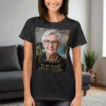 Elegant Black & Gold 80th Birthday Party Photo T-Shirt<br><div class="desc">Celebrate 80 in style with this elegant black and gold birthday photo T-shirt. Featuring chic gold script “Cheers to 80 Years” and your custom photo, this shirt makes the perfect keepsake for the guest of honour — or matching apparel for family and friends. Designed with a bold black background and...</div>