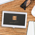 Elegant black gold monogrammed script name business card holder<br><div class="desc">Trendy luxury exclusive looking monogrammed gold business card case featuring a faux gold square over a stylish classy black leather look (printed) background.             Personalize it with your white script signature name and monogram name initials.</div>