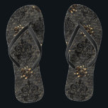 Elegant black gold roses damask gothic flip flops<br><div class="desc">Elegant,  black and gold flip flops with gold and black roses,  black damask and antique handwritten script background. Elegant,  antique,  gothic design. Matching items are available in my store.</div>