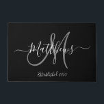 Elegant Black Grey Monogram Script Family Name Doormat<br><div class="desc">Personalized black and white and grey monogram design with bride and groom last name and wedding date on a black background. Makes a unique and great gift for newlyweds starting a new family. Great for new house together. Customize with your name, monogram initial and wedding date and colours. Elke Clarke©...</div>