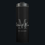 Elegant Black Monogram Newlywed Wedding Thermal Tumbler<br><div class="desc">Stay hydrated on your honeymoon with this Elegant Black Monogram Newlywed Wedding Thermal Tumbler. This is a modern customizable design is in black, white and grey. Bride and groom's first names are on the centre in modern white handwriting script lettering and initial of new last name is in grey. Established...</div>