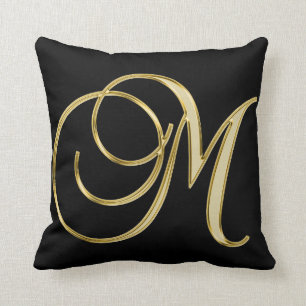 ELEGANT BLACK PILLOW WITH GOLDEN DETAILS