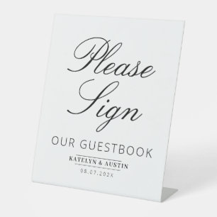 elegant black script guestbook sign