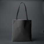 Elegant Black Tote Bag<br><div class="desc">This tote bag has a solid black background, it's designed as a foundational piece. It lets your wardrobe take centre stage. It's a neutral tone designed to harmonize with bold, earthy, or coastal palettes. It has no graphics or embellishments—intentionally blank to pair seamlessly with statement leggings, t-shirts, etc. Minimalist elegance...</div>