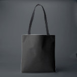 Elegant Black Tote Bag<br><div class="desc">This tote bag has a solid black background, it's designed as a foundational piece. It lets your wardrobe take centre stage. It's a neutral tone designed to harmonize with bold, earthy, or coastal palettes. It has no graphics or embellishments—intentionally blank to pair seamlessly with statement leggings, t-shirts, etc. Minimalist elegance...</div>