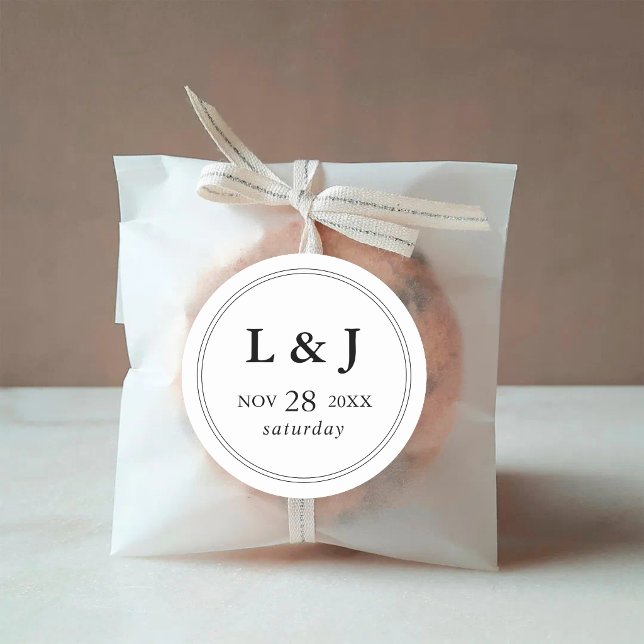 Elegant Black & White Classic Script Wedding Round Sticker (Elegant black and white wedding sticker adds timeless style to favor packaging.)