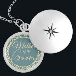 Elegant Blue and Cream Leaf Mother of the Groom Locket Necklace<br><div class="desc">This beautiful locket is a special accessory designed for the Mother of the Groom. The locket features a classic blue and cream colour scheme with a cream-coloured leaf pattern inside, adding a touch of elegance and natural beauty. The hidden message inside is a special touch that will make this locket...</div>