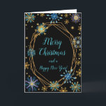 Elegant Blue and Gold Snowflakes Merry Christmas Holiday Card<br><div class="desc">A beautiful Christmas card design featuring elegant turquoise blue and gold snowflakes on a black background. Inside there is a space for a message. A perfect way to greet your friends and relatives in this festive season. The background colour of the inside and the text can be changed to suit...</div>