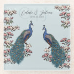 Elegant Blue Floral Peacock Wedding Glass Coaster<br><div class="desc">This Elegant Blue Floral Peacock Wedding Glass Coaster features a hand-drawn blue and teal peacock perched on magnolia branches in full bloom, illustrated in delicate black ink against a chic soft blue background. Designed for weddings, this custom Chinoiserie-style coaster adds a sophisticated touch to reception tables, cocktail bars, and wedding...</div>