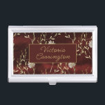 Elegant Burgundy Floral Personalized Business Card Holder<br><div class="desc">This is a beautiful simple yet classy flower and vine that is a very elegant look. Add your name to personalize. The burgundy colour is beautiful. Add this piece with a few other accessories and you’ll have an over-the-top class business accessory collection. A faux rustic burgundy background adds to the...</div>